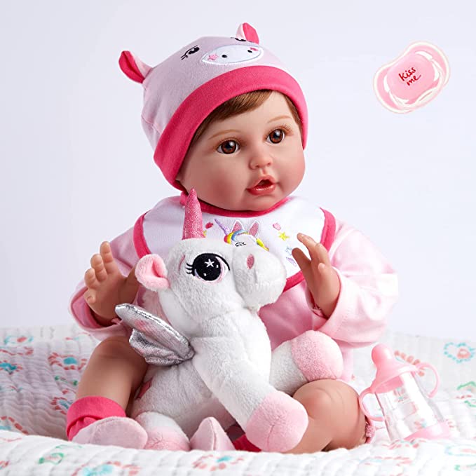 Bebé realistas con peluche de Unicornio