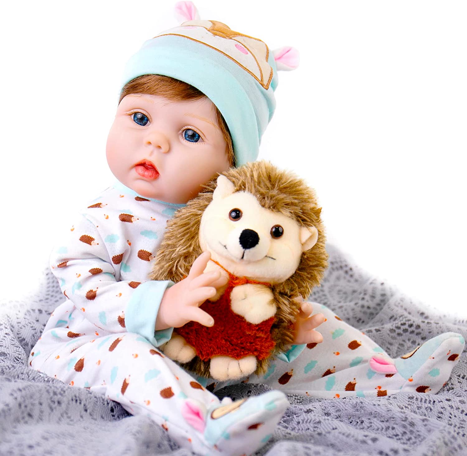 Bebé Realista con juguete erizo y accesorios